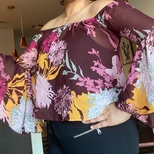 Blouse with flared sleeves